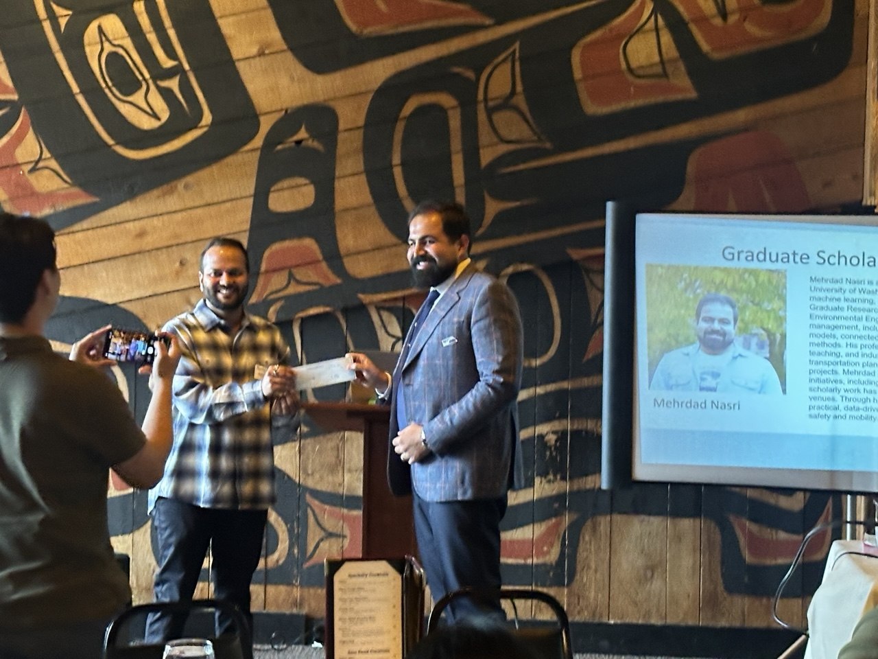 Mehrdad Nasri receiving graduate recognition